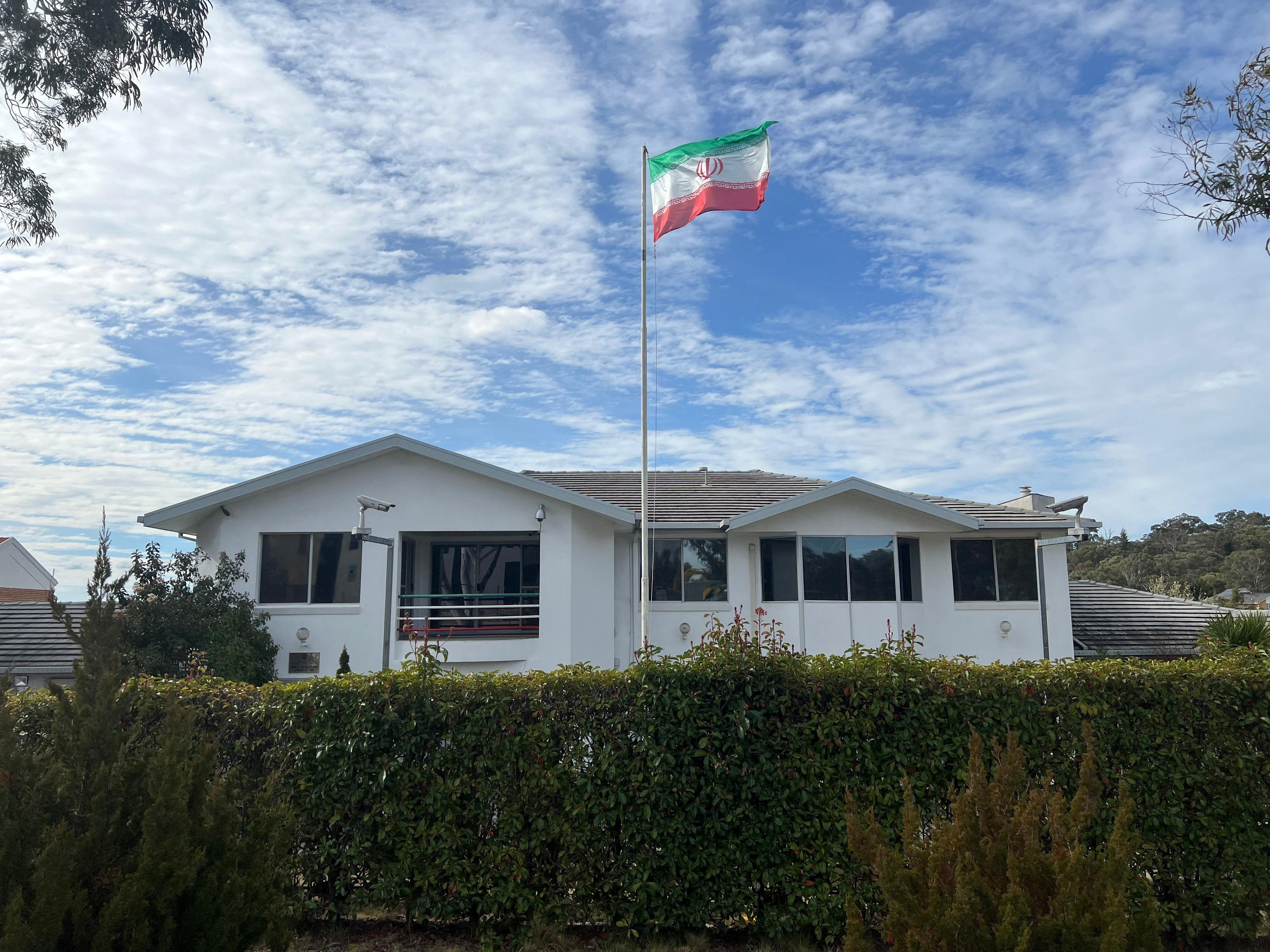 A flag flutters above the Embassy of the Islamic Republic of Iran