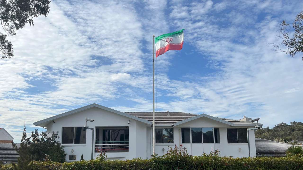 A flag flutters above the Embassy of the Islamic Republic of Iran