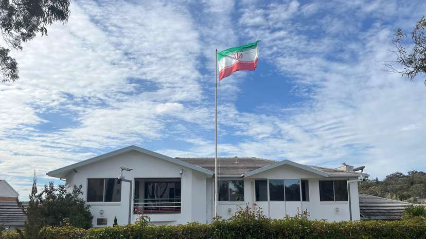 A flag flutters above the Embassy of the Islamic Republic of Iran