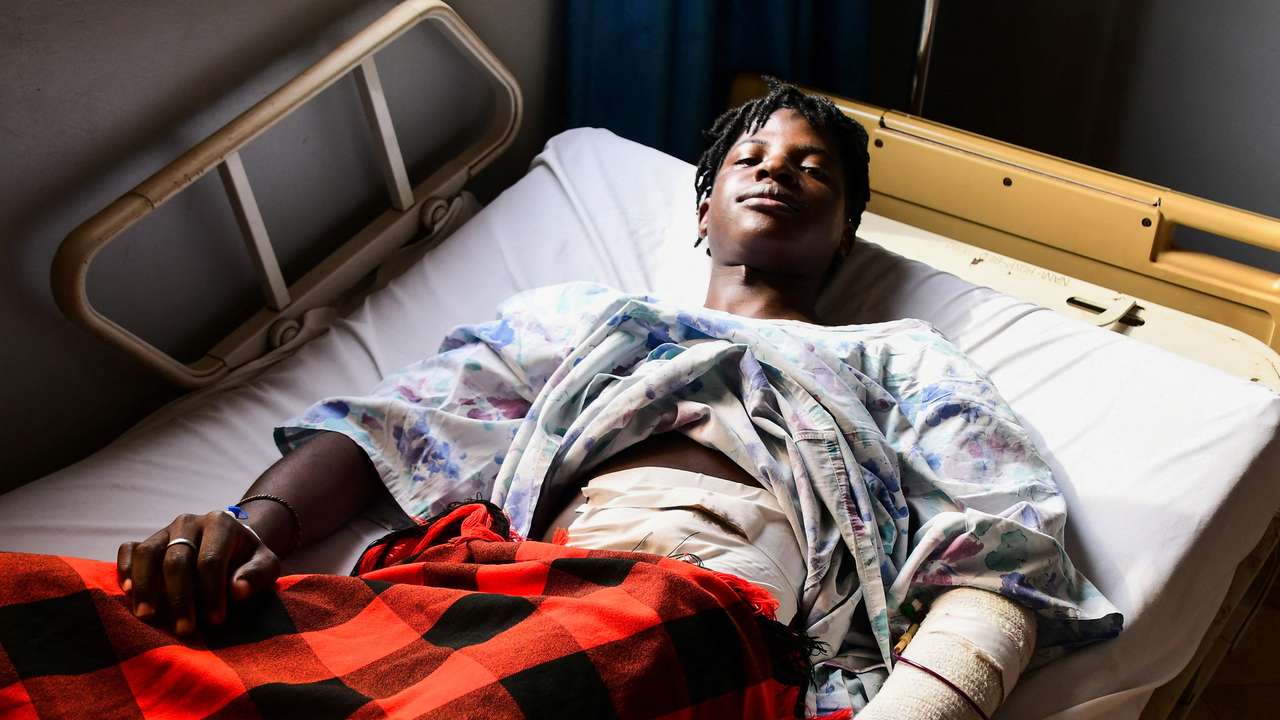 Ugandan LGBTQ activist Steven Kabuye receives treatment after he was stabbed by unknown people, at a hospital in Kitende along Entebbe road on the outskirts of Kampala