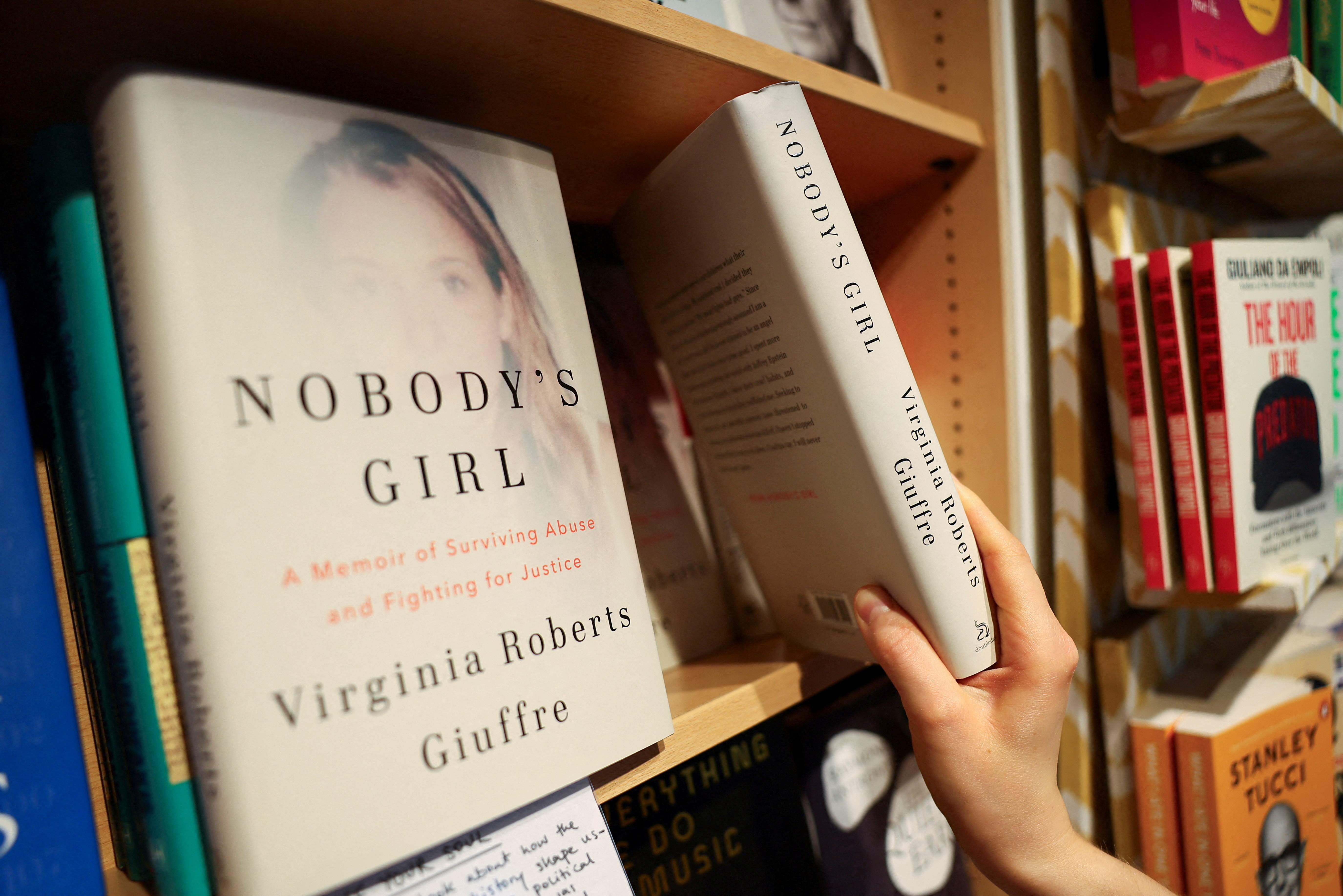 Copies of "Nobody's Girl: A Memoir of Surviving Abuse and Fighting for Justice", the posthumously published memoir by Virginia Giuffre, are displayed at a Foyles bookshop in London