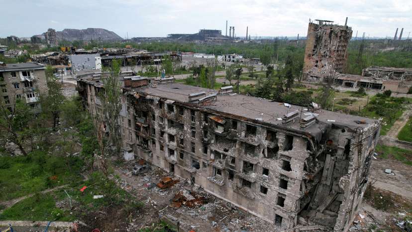 FILE PHOTO: A view shows a heavily damaged residential building in Mariupol