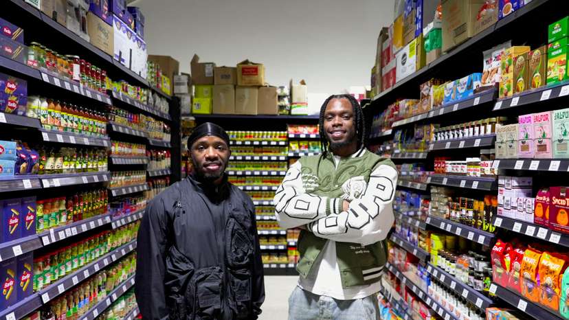British rappers Krept and Konan stand in their new supermarket called Saveways that caters to ethnic minorities in Croydon