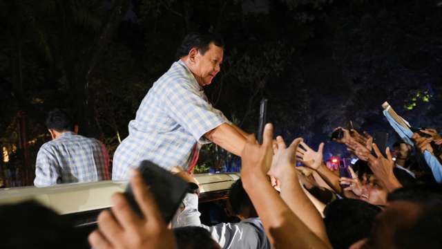 Indonesia's presidential candidate Prabowo Subianto greets his supporters in Jakarta