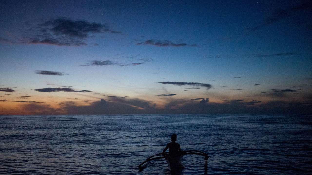 FILE PHOTO: Filipino fishermen in Masinloc, Zambales