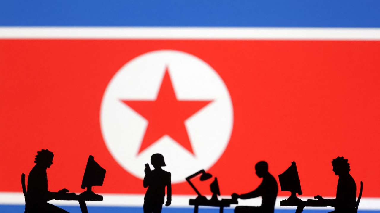 Illustration shows miniatures and North Korea flag