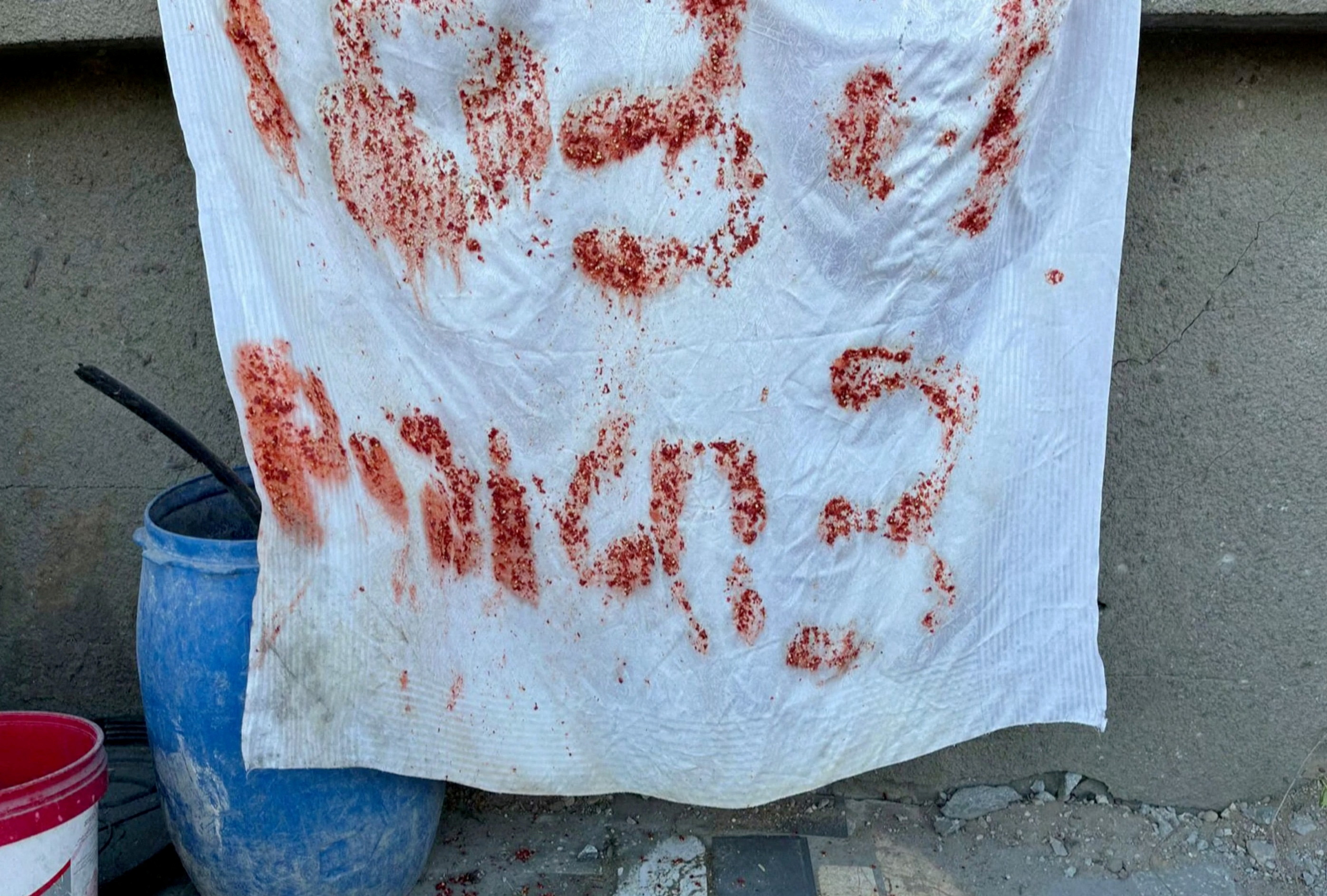 FILE PHOTO: S.O.S. signs found hung on killed hostages hideout, Israeli military says