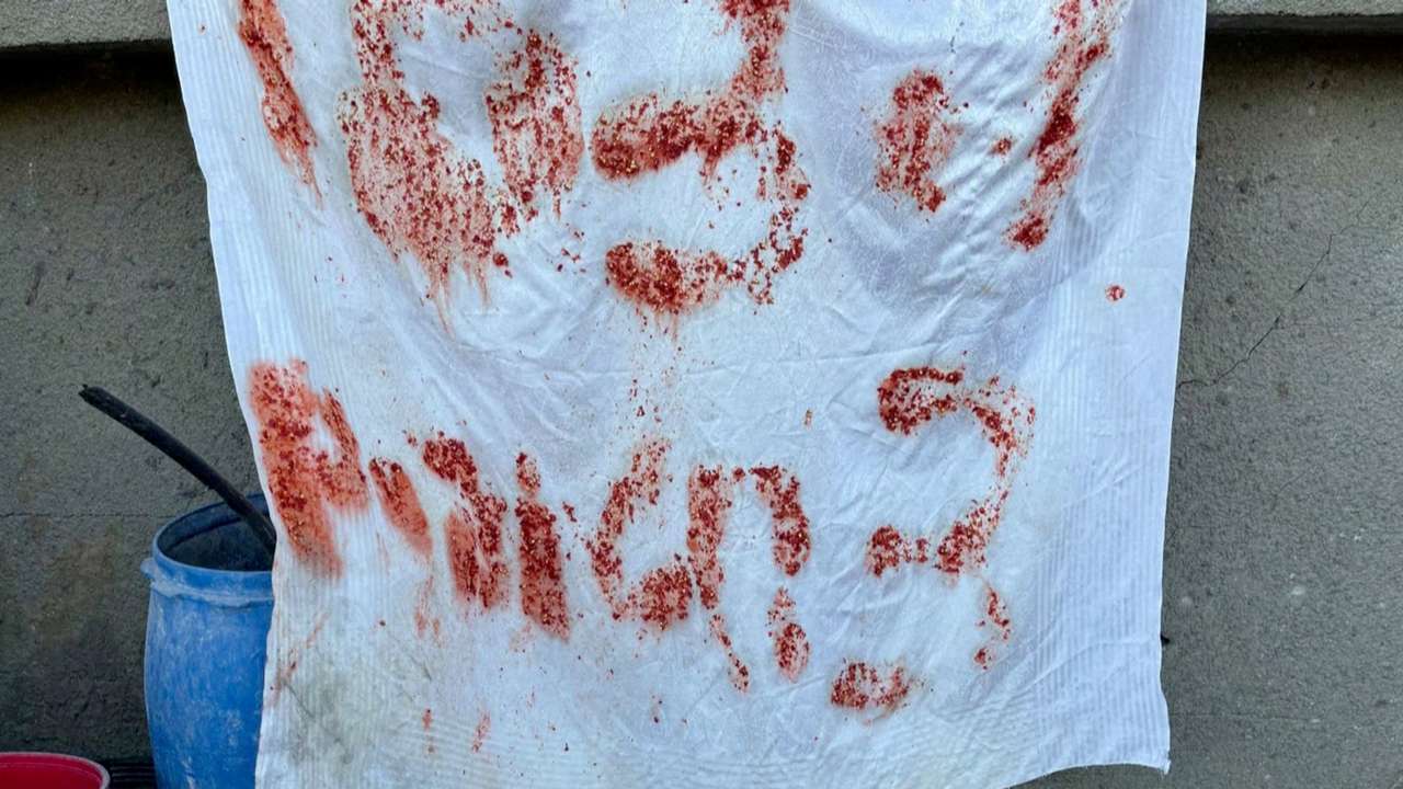 FILE PHOTO: S.O.S. signs found hung on killed hostages hideout, Israeli military says