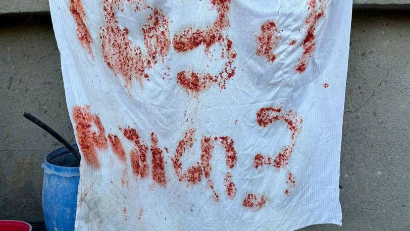 FILE PHOTO: S.O.S. signs found hung on killed hostages hideout, Israeli military says