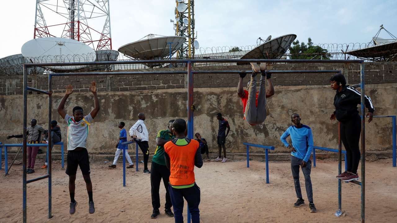 The Wider Image: From France to Mali, a deportee's struggle far from home