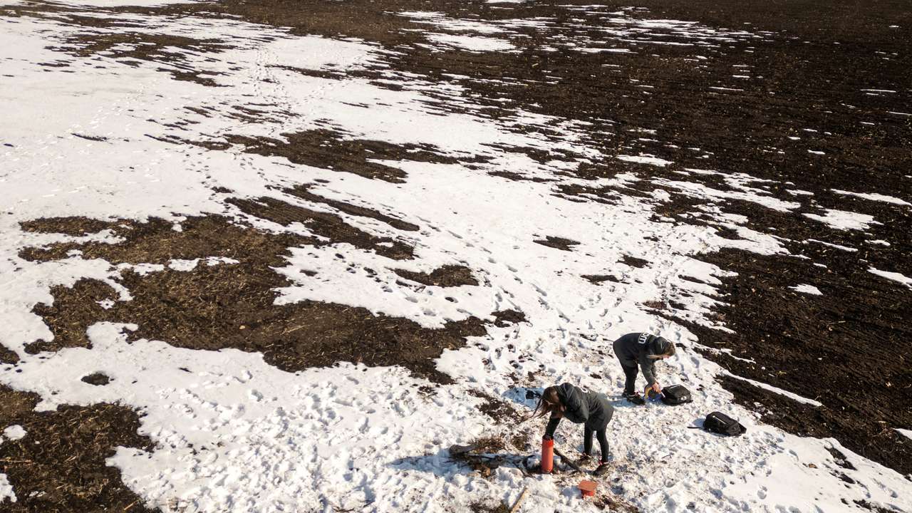 FILE PHOTO: Environmental experts test the groundwater level at the Polokhivske lithium deposit that will be developed by Ukrlithium Mining in the Malovyskivsky district of Ukraine