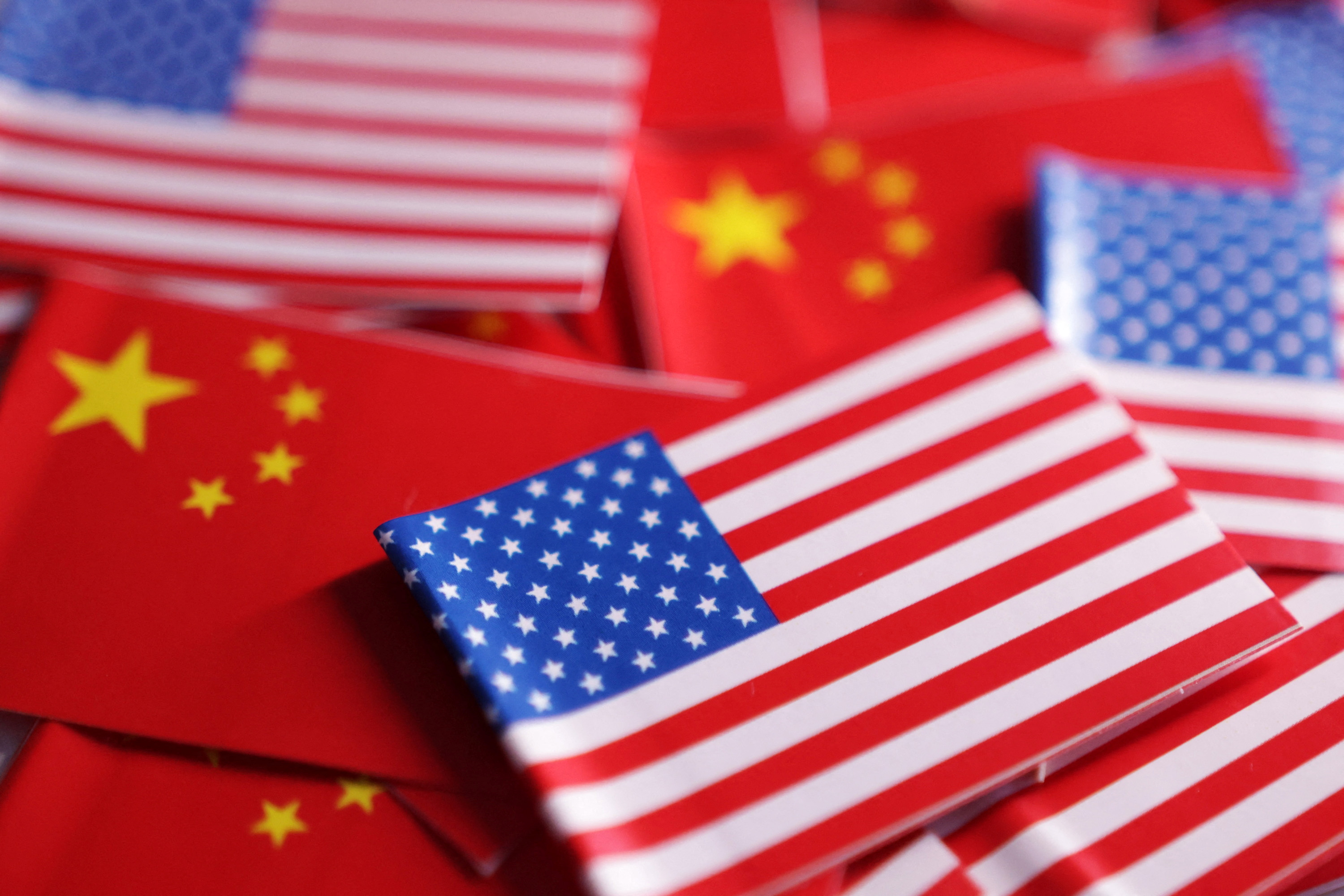 Illustration shows U.S. and Chinese flags