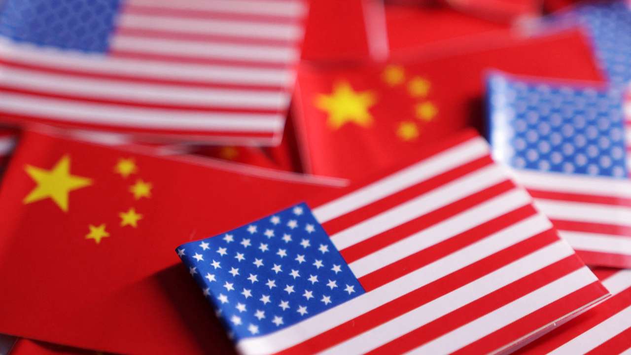 Illustration shows U.S. and Chinese flags