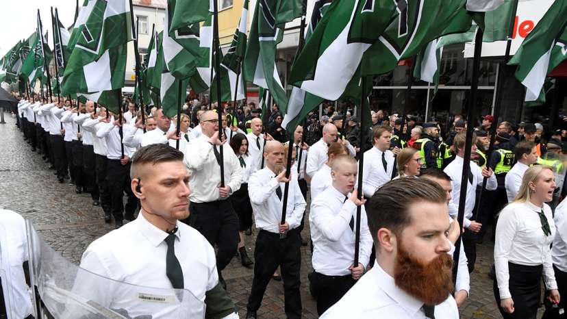 FILE PHOTO: Members of the Neo-nazi Nordic Resistance Movement march through the town of Ludvika