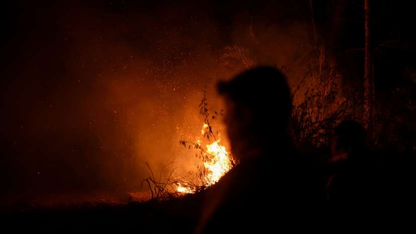 FILE PHOTO: Wildfire smoke covers the sky as Bolivia's forests burn, in Nuflo de Chavez Province