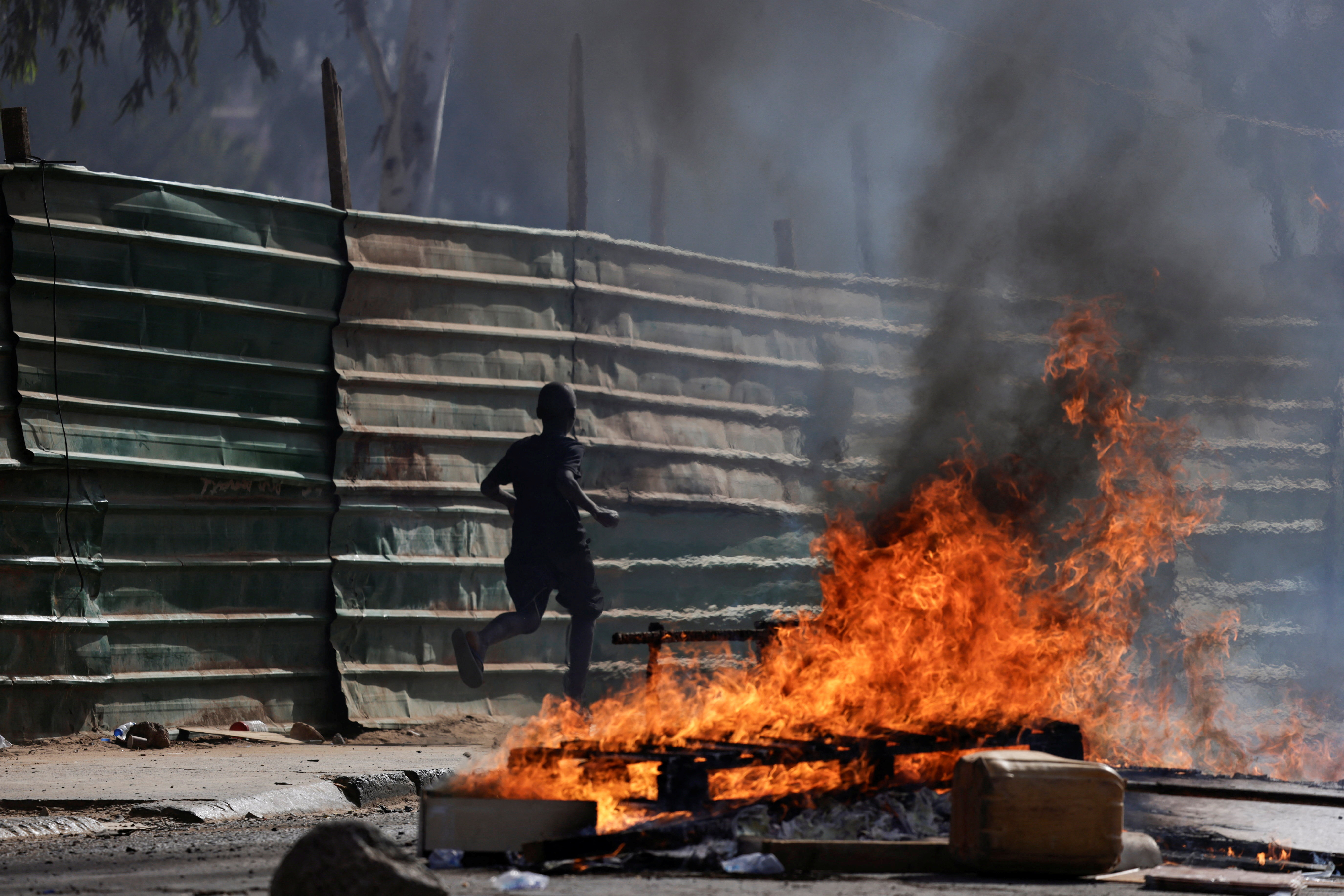 Senegalese police crack down on protests over election delay in Dakar