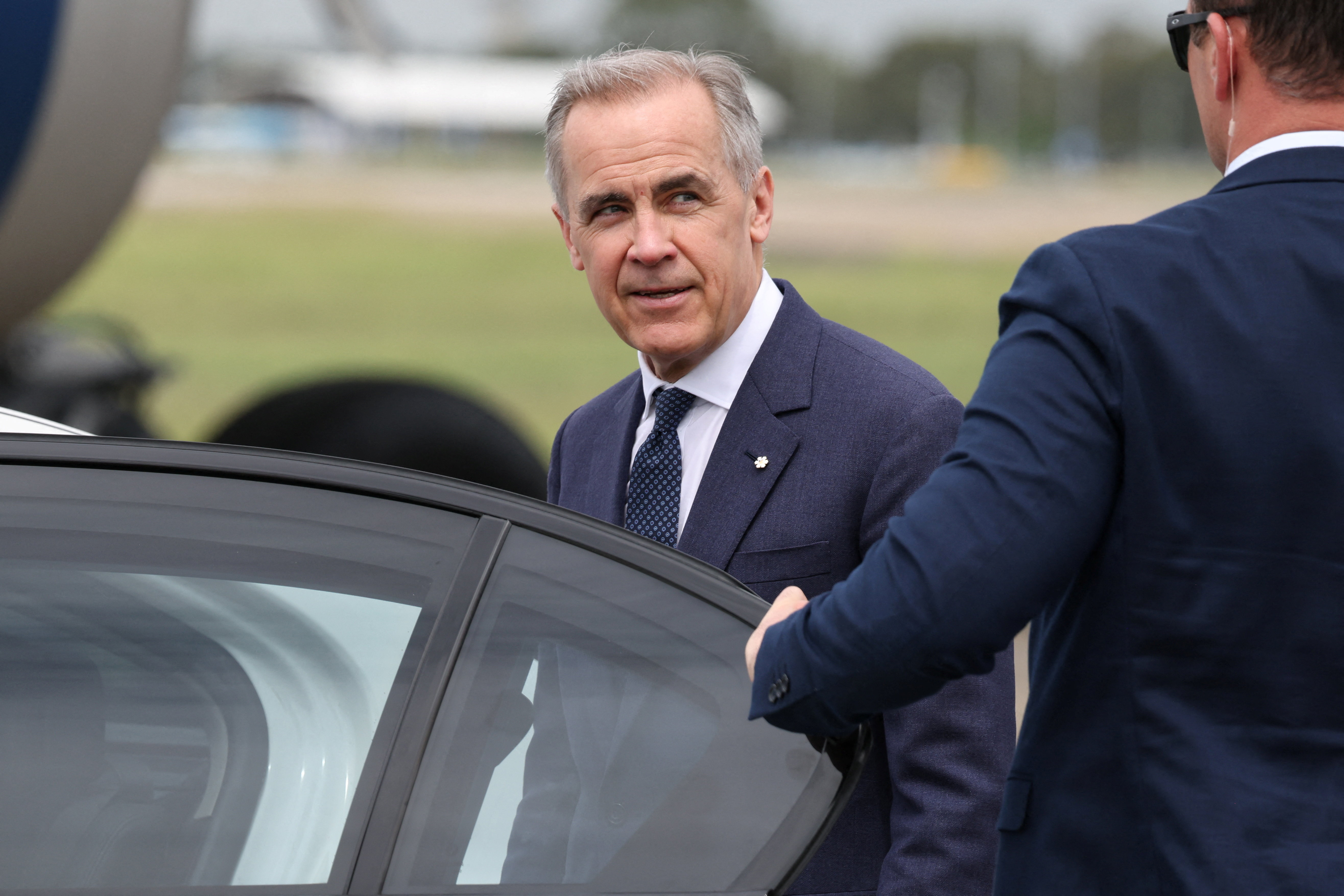 Canadian Prime Minister Mark Carney and his wife Diana Fox Carney arrive in Sydney