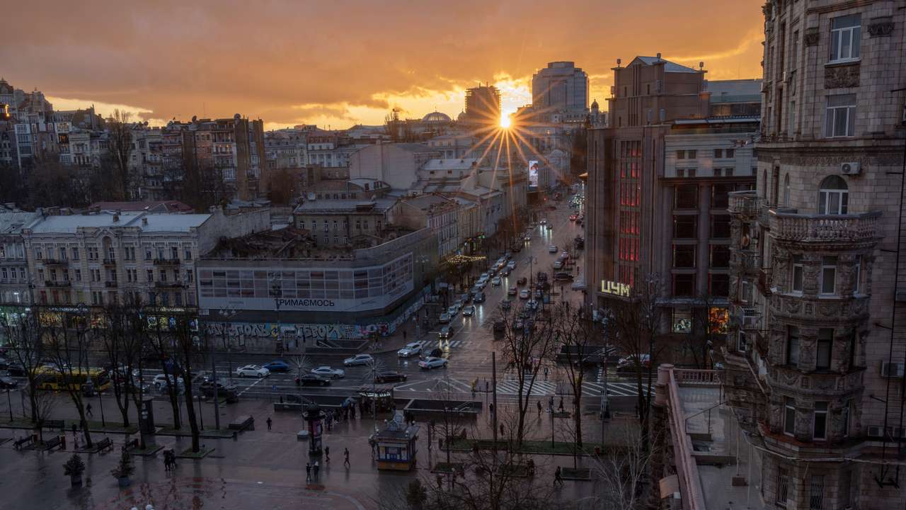 Evening sun sets over the skyline near Khreshchatyk Street in Kyiv