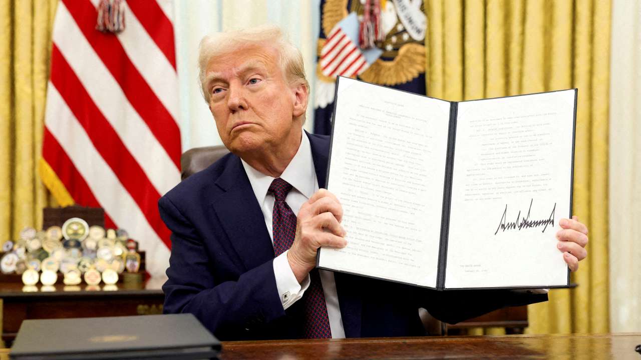 FILE PHOTO: U.S. President Trump signs an executive order in the Oval Office, at the White House