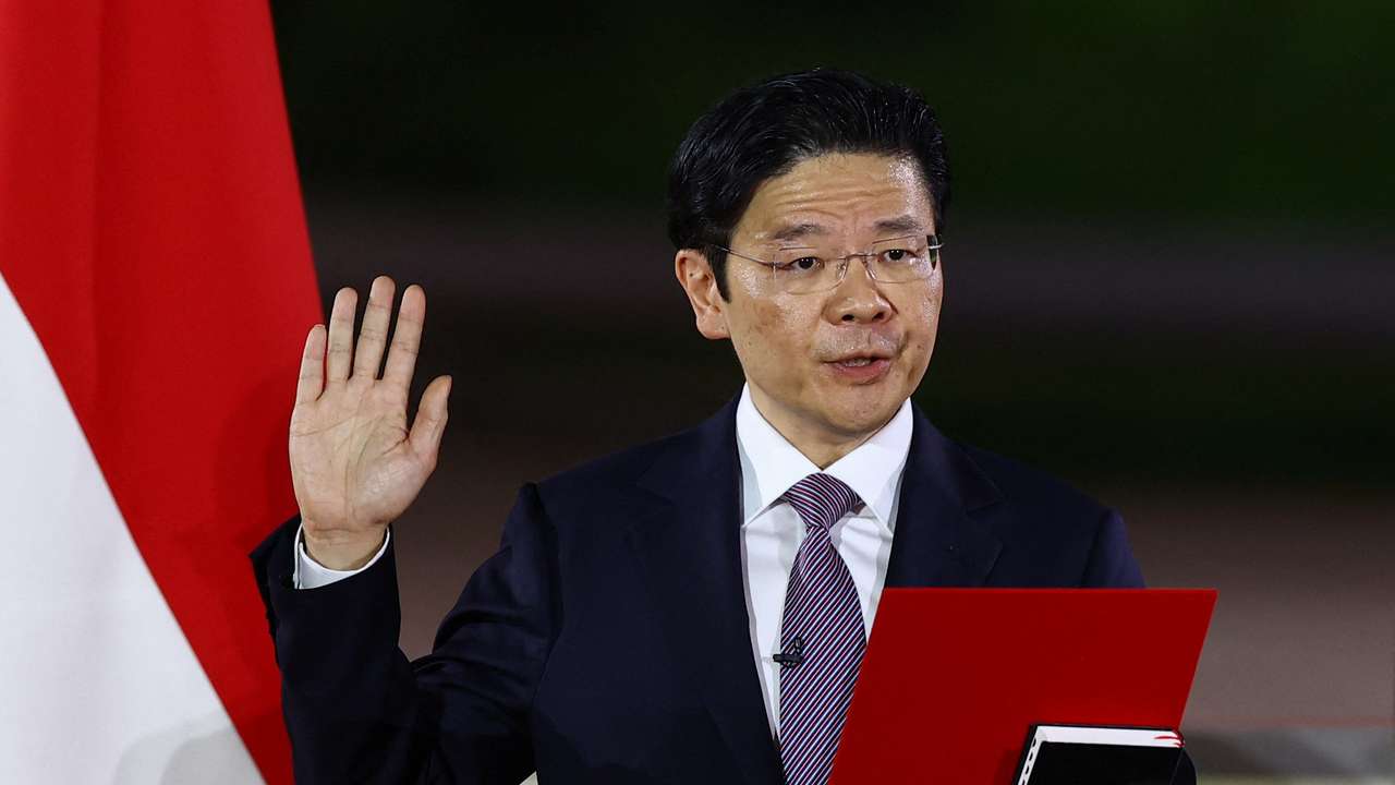 Singapore's Deputy Prime Minister and Minister of Finance Lawrence Wong is sworn in as Singapore's fourth Prime Minister