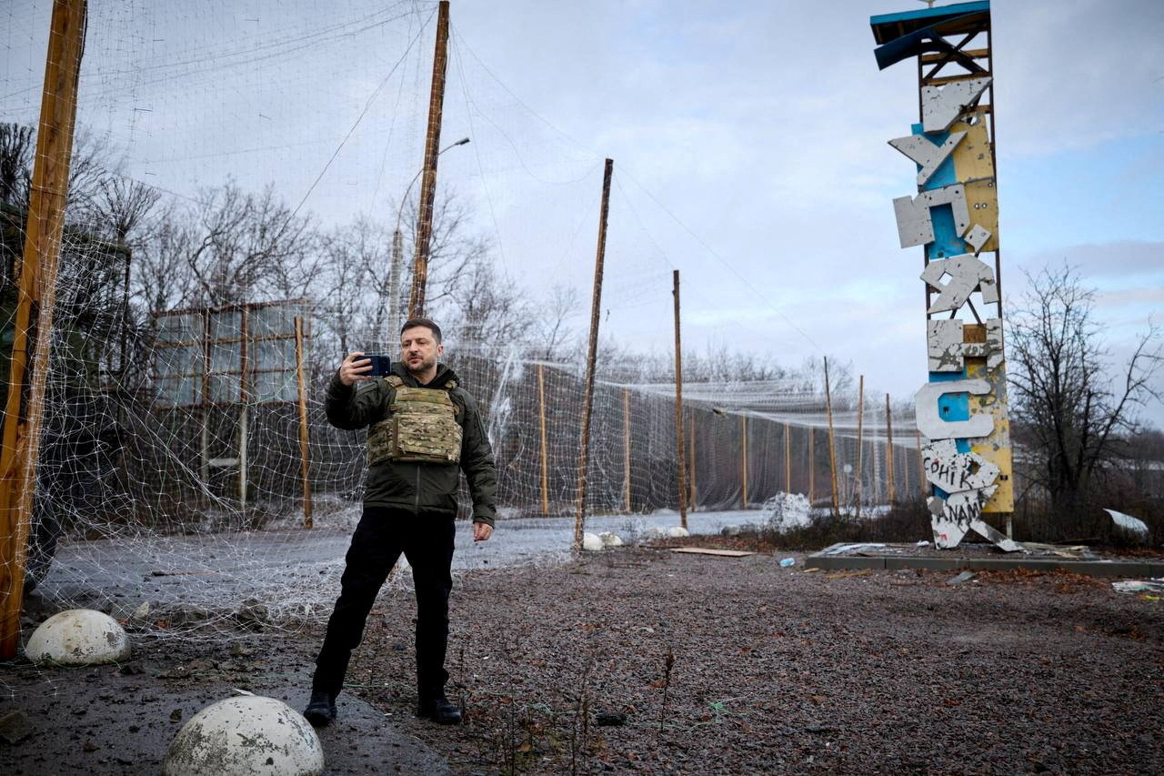 FILE PHOTO: Ukraine's President Zelenskiy appears in the frontline town of Kupiansk