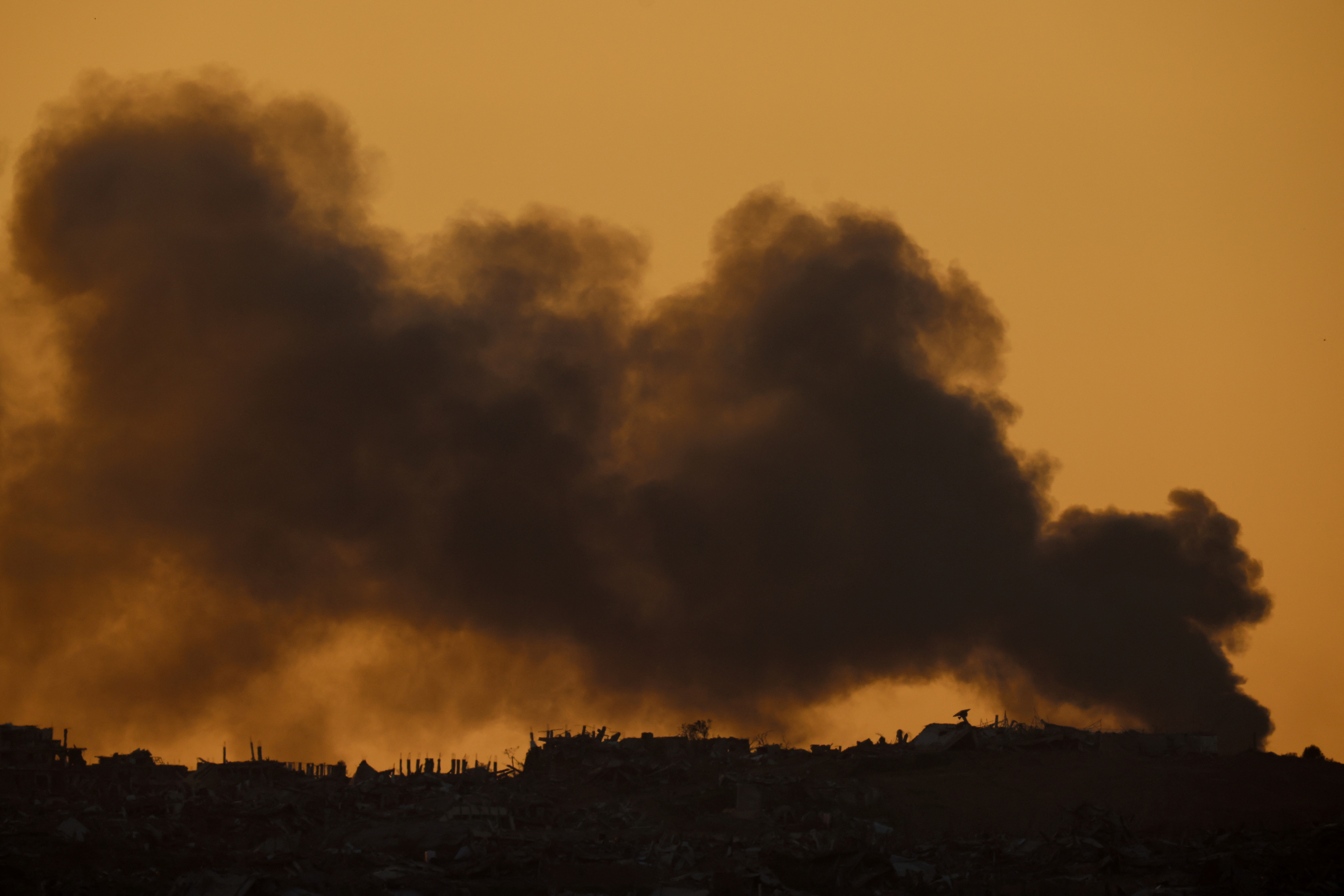 Smoke rises over Gaza, as seen from Israel