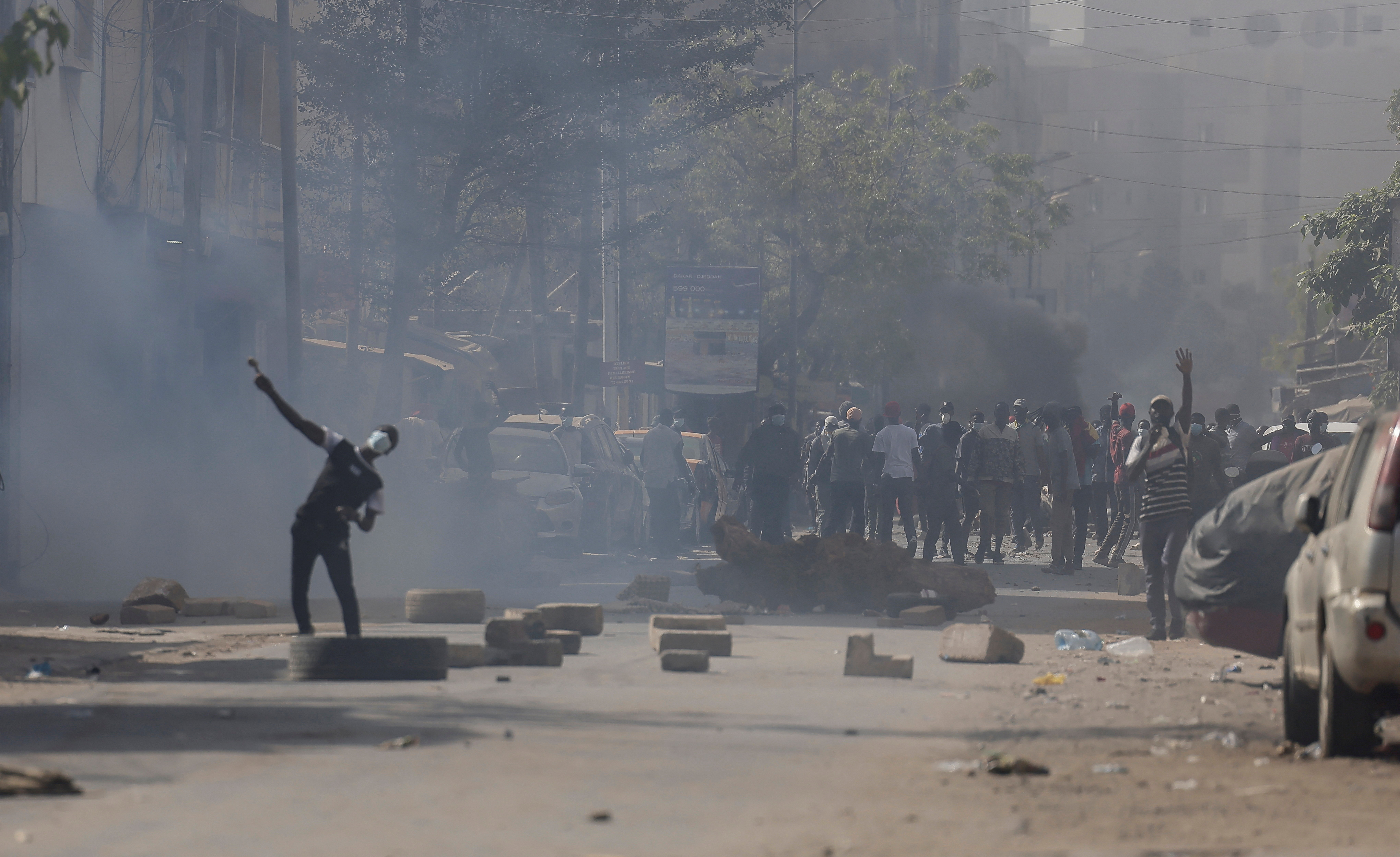 Senegalese demonstrators protest against the postponement of the Feb. 25 presidential election, in Dakar