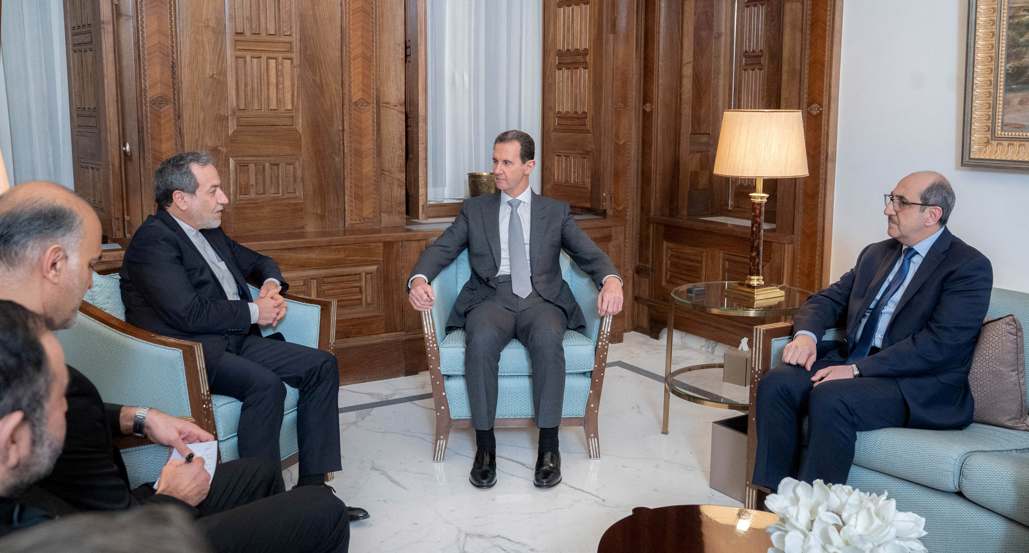 Syria's President Bashar al-Assad meets with Iran's Foreign Minister Abbas Araghchi, in Damascus