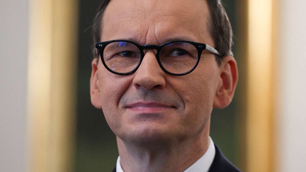 FILE PHOTO: Polish Prime Minister Mateusz Morawiecki from Law and Justice party looks on before presidential consultations with the leaders of the two main parties in the newly elected parliament - Law and Justice and Civic Platform, in Presidential Palace