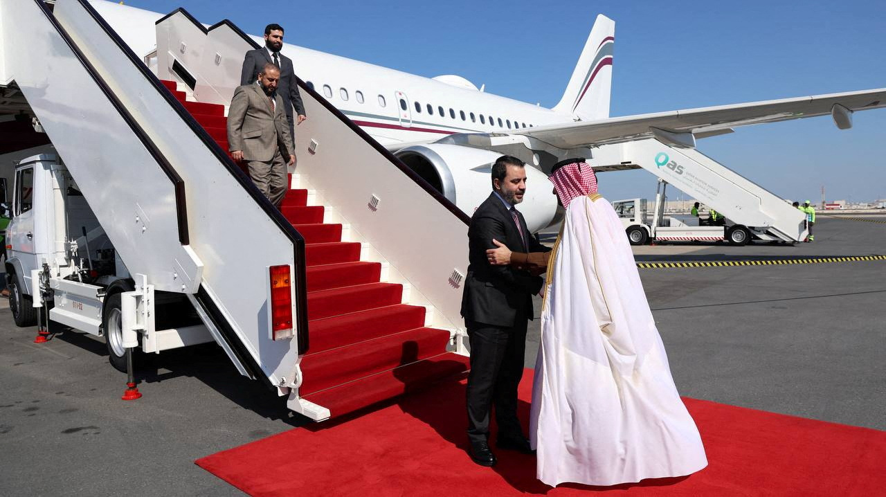 Syrian Foreign Minister Asaad Hassan al-Shibani, appointed by the country's new rulers, arrives in Doha