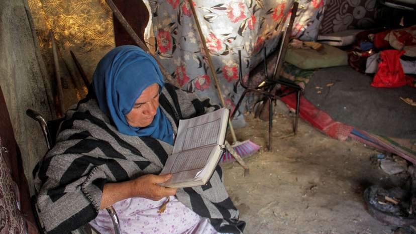 Displaced Palestinians shelter at an UNRWA school in Jabalia refugee camp in the northern Gaza Strip
