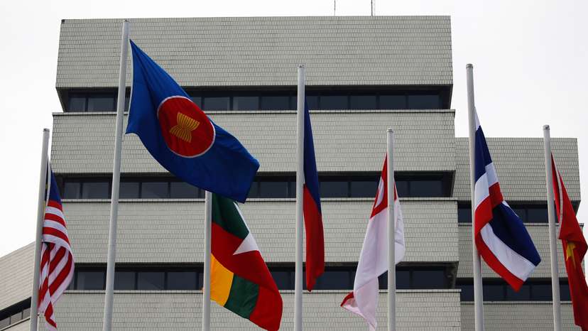 Flags outside ASEAN secretariat building ahead of the summit in Jakarta