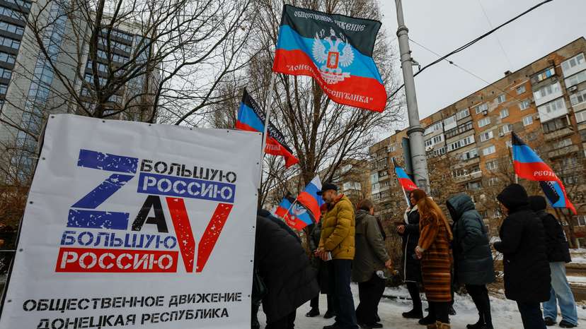 Activists collect signatures in support of Russian President Vladimir Putin as a candidate in the upcoming presidential election, in Donetsk
