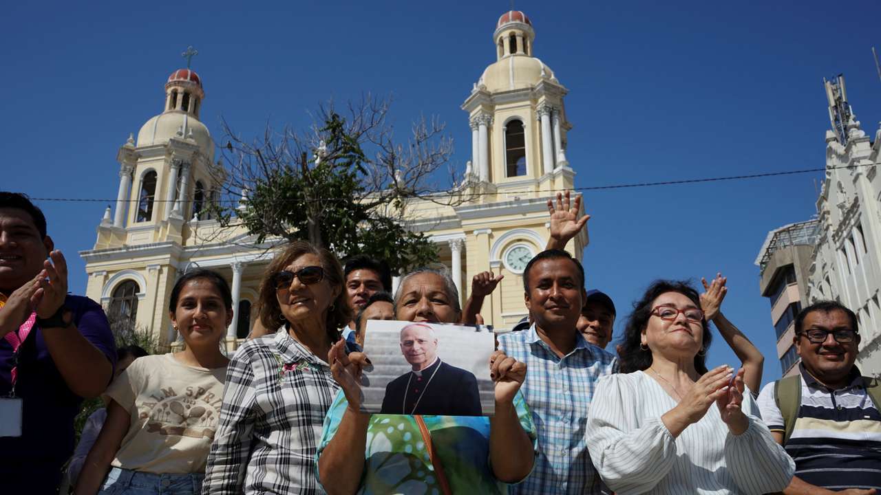 People gather in front of the Cathedral of Saint Mary in Chiclayo