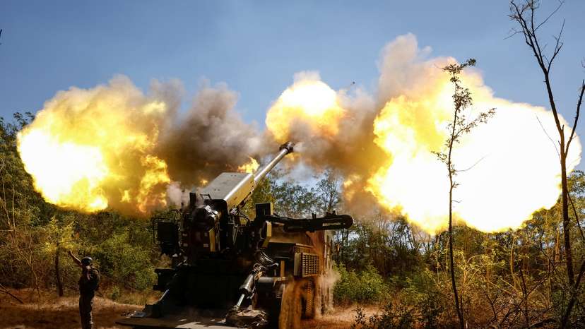A Ukrainian serviceman fires a self-propelled howitzer towards Russian troops in Zaporizhzhia region
