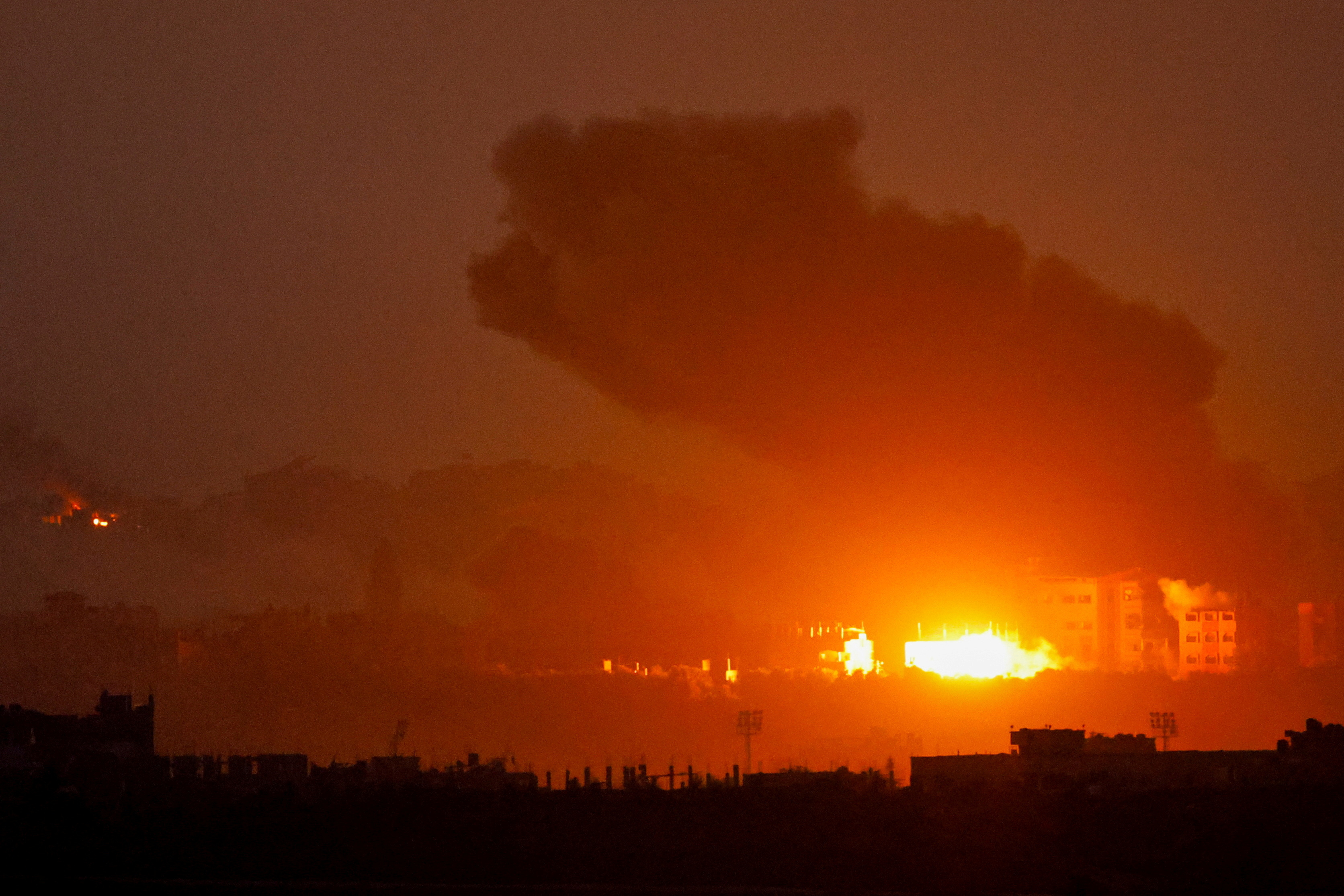 Smoke billows after an Israeli airstrike in Gaza, amid the ongoing conflict between Israel and the Palestinian Islamist group Hamas, as seen from southern Israel