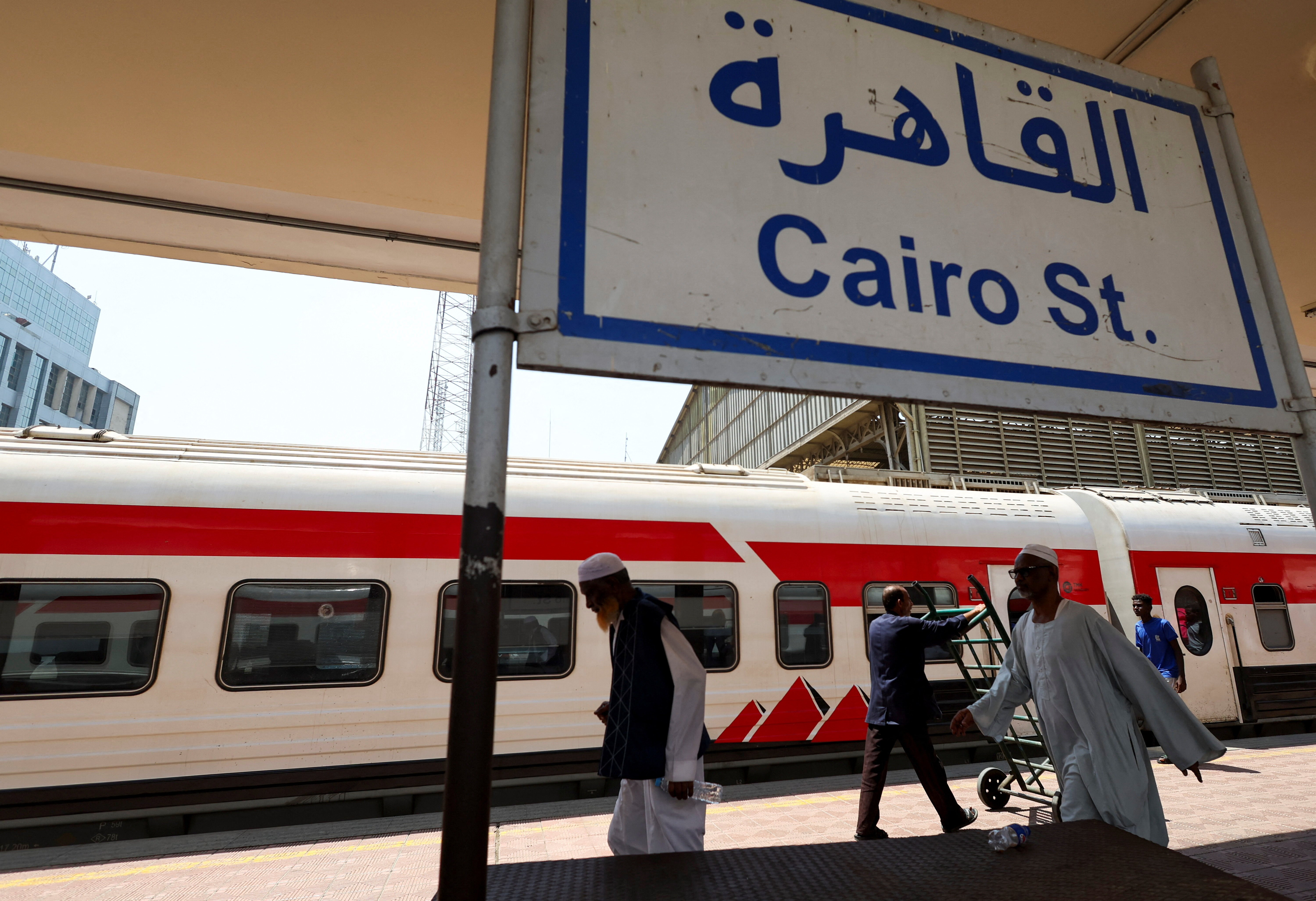 Displaced Sudanese head home from Egypt as a free train with a voluntary return is coordinated by the Egyptian government, in Cairo