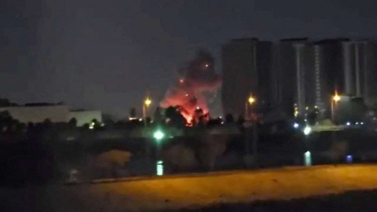 Smoke and fire rise during reported drone and rocket strikes at U.S. embassy in Baghdad