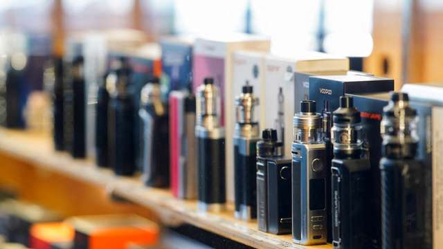 FILE PHOTO: Vape pens stand in a display cabinet at a vape store, in Melbourne, Australia, May 2, 2023. REUTERS/Sandra Sanders/File Photo