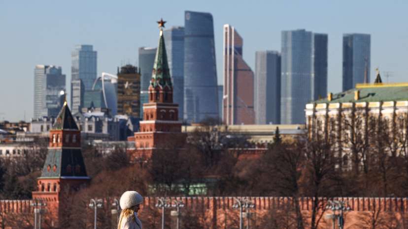 FILE PHOTO: A view shows the Moscow City business centre behind the Kremlin wall in Moscow