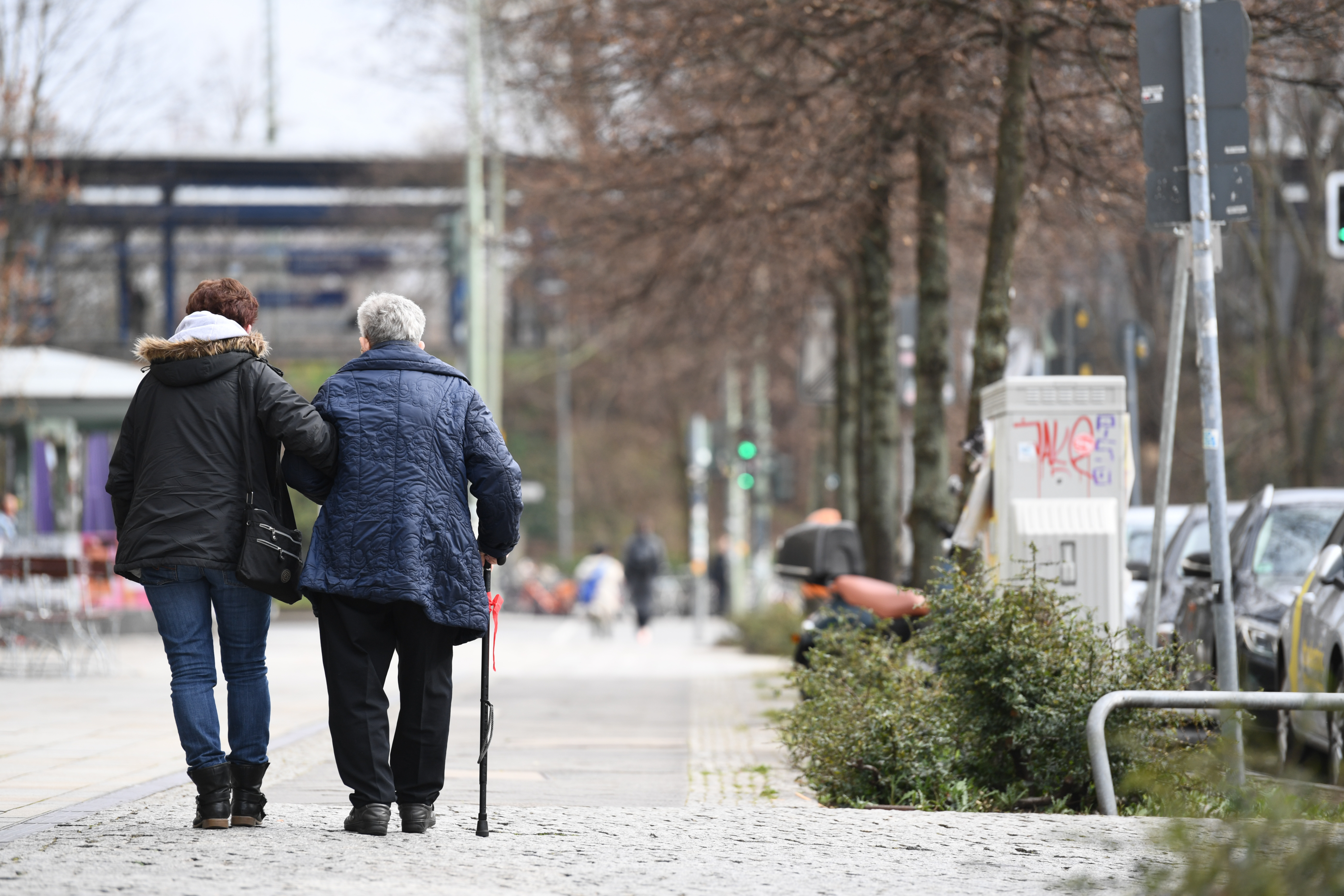 Two elderly persons walk during the spread of coronavirus disease (COVID-19) in Berlin