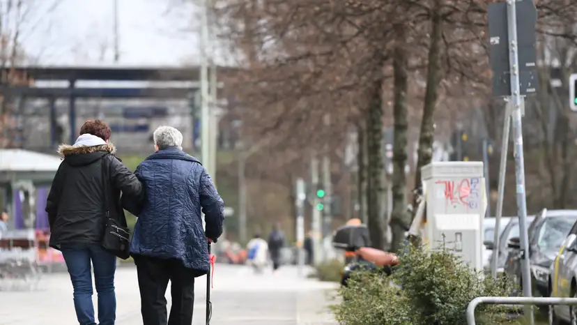 Two elderly persons walk during the spread of coronavirus disease (COVID-19) in Berlin