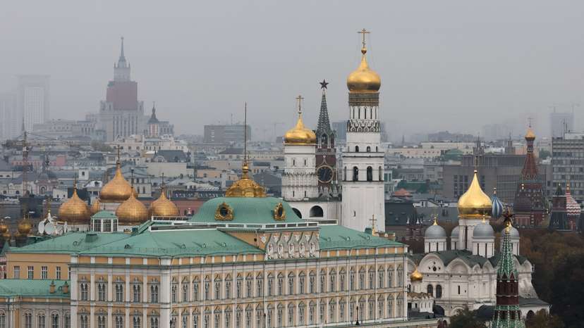 Kremlin's Spasskaya Tower, the Ivan the Great Bell tower and the Grand Kremlin Palace in Moscow