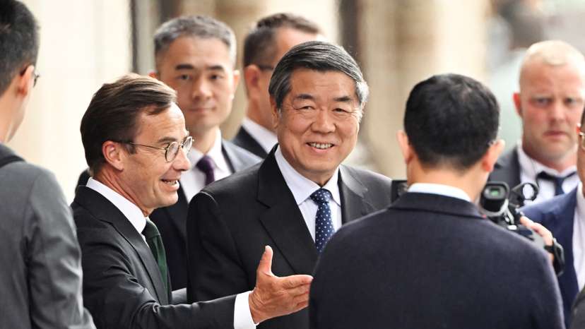 Swedish Prime Minister Ulf Kristersson greets Chinese Vice Premier He Lifeng at Rosenbad before trade talks between the U.S. and China in Stockholm