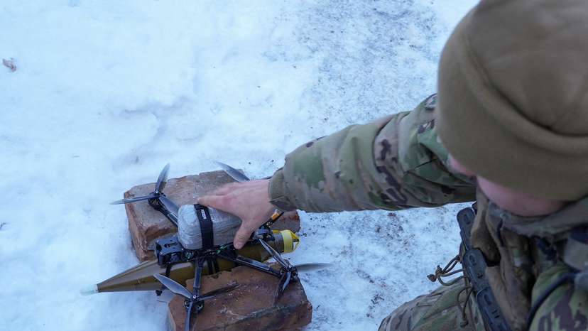 FILE PHOTO: Ukrainian serviceman prepares to fly a first person view (FPV) drone at a position near the town of Horlivka