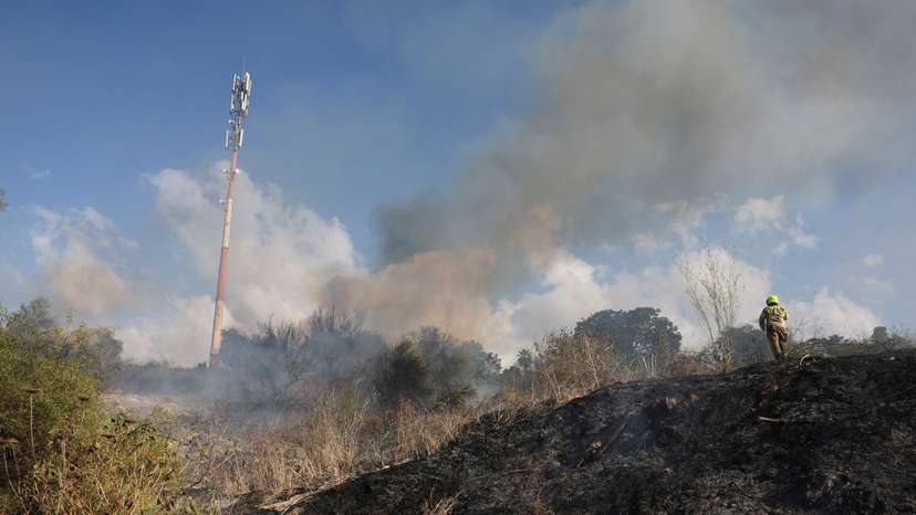 Smoke billows in central Israel after a missile attack from Yemen
