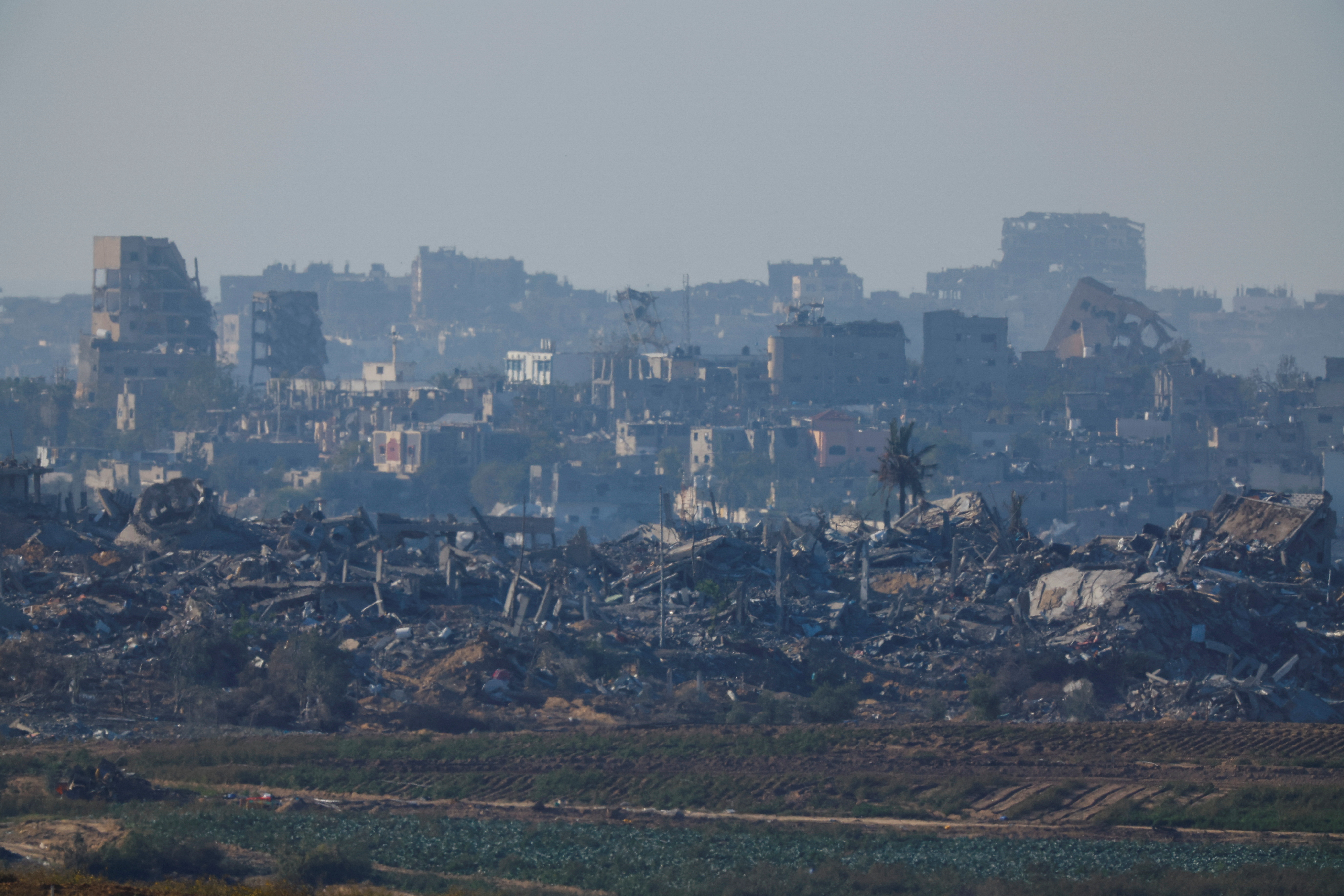 A view shows the damaged buildings of Northern Gaza strip, as seen from the viewpoint in Sderot