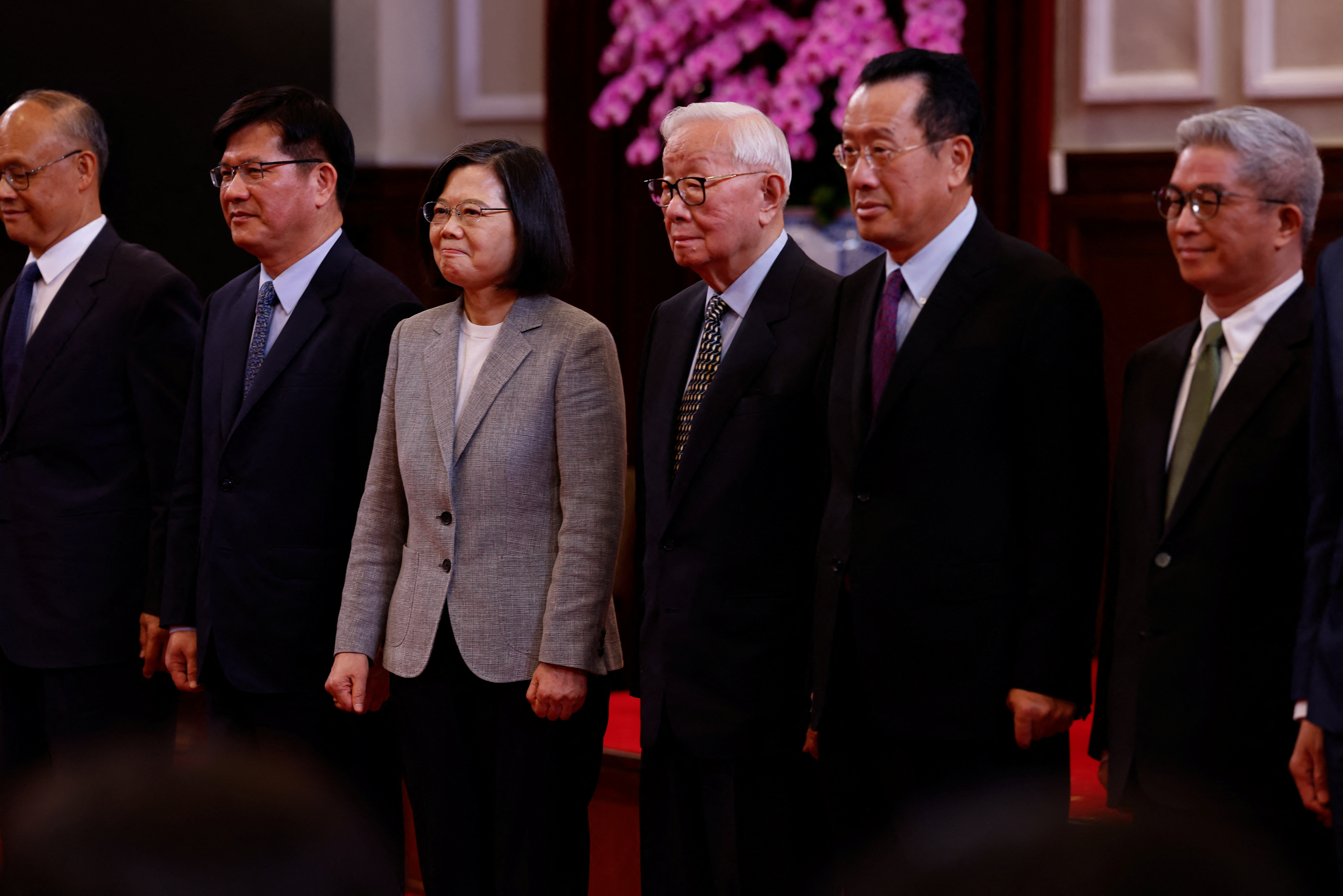 Taiwan's President Tsai Ing-wen poses for a photo with Taiwan's APEC representative and TSMC founder Morris Chang at a press conference in Taipei,