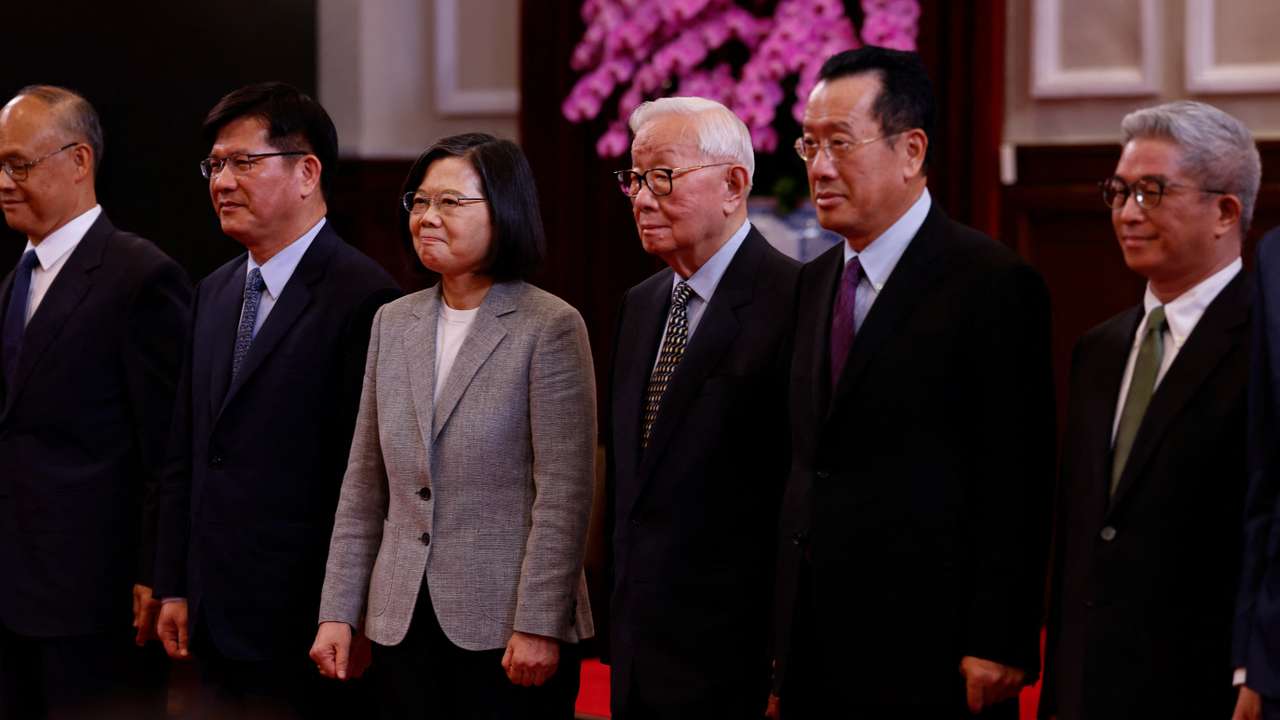 Taiwan's President Tsai Ing-wen poses for a photo with Taiwan's APEC representative and TSMC founder Morris Chang at a press conference in Taipei,