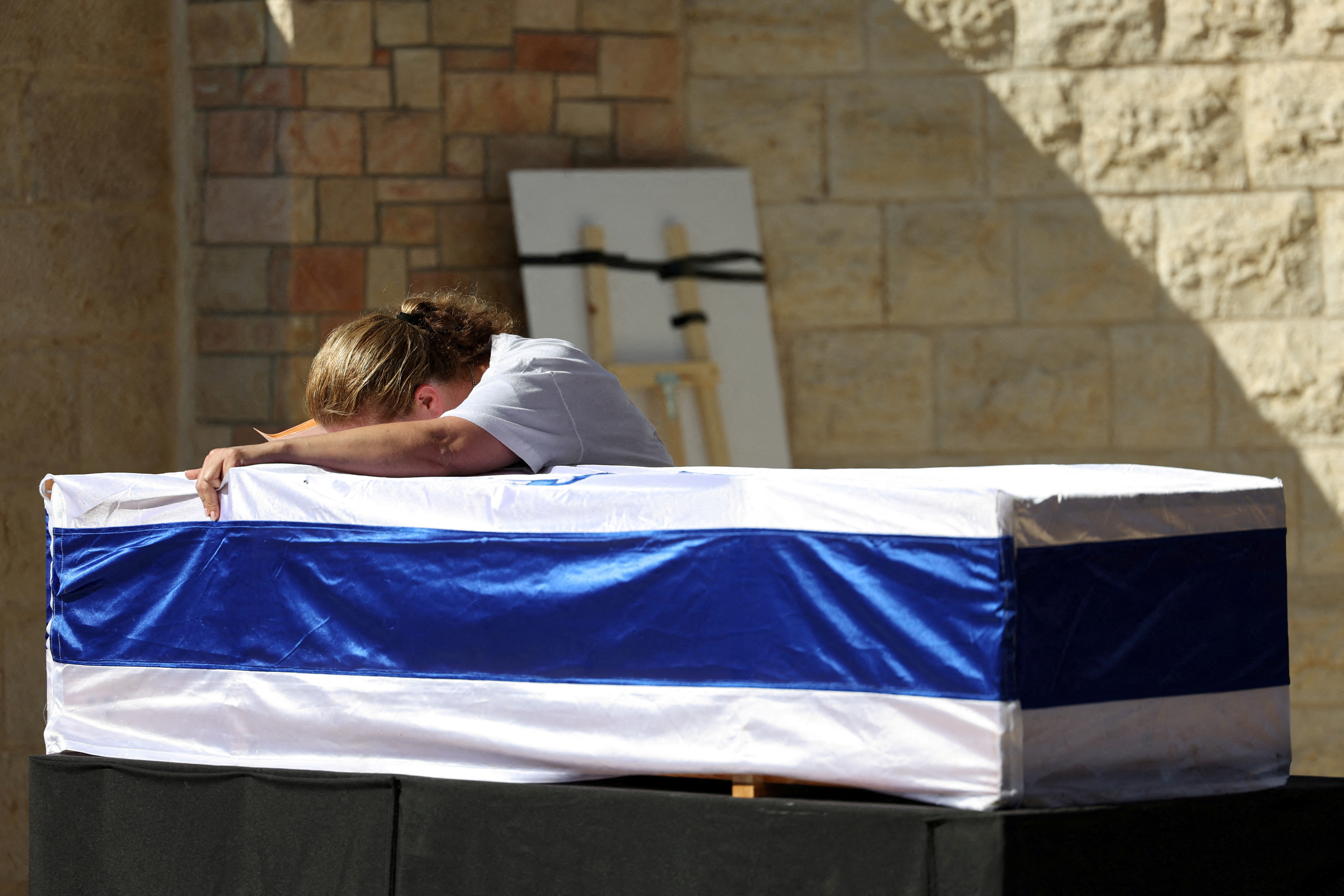 Friends and family mourn during Israeli soldier Corporal Noa Marciano's funeral, in Modiin